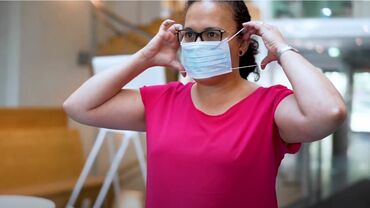Image of woman wearing face mask