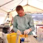Doctor in a laboratory, in the field, during Ebola mission
