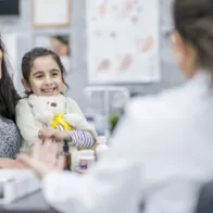 Image showing a mother and her daugther visiting a doctor