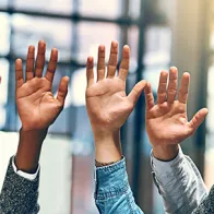 Raising hands. ©Istock