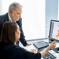 Surveillance experts looking at data