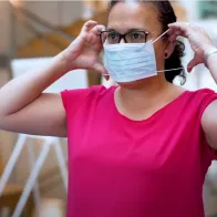 Image of woman wearing face mask