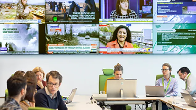 People working in ECDC on detecting outbreak threats of infectious diseases