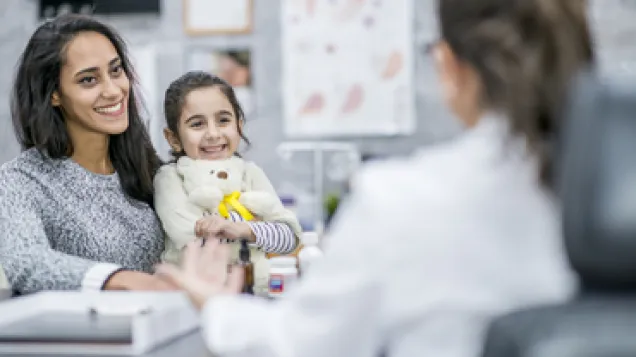 Image showing a mother and her daugther visiting a doctor