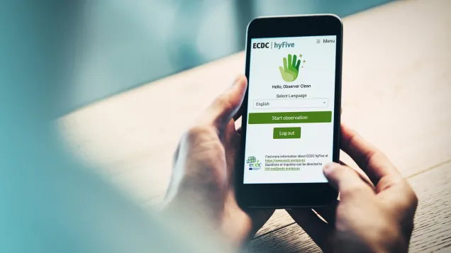 Image showing hands with hyFive tool on mobile