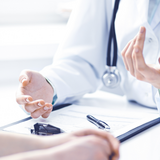 Doctor and patient - only hands visible