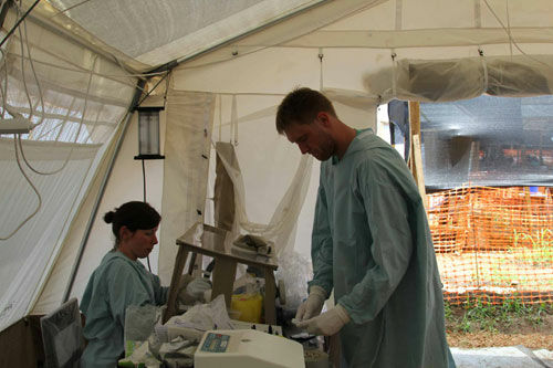 EPIET Postcard from the field - EUPHEM fellow Zoltán Kis working in a mobile laboratory, providing Ebola diagnosis in Guinea