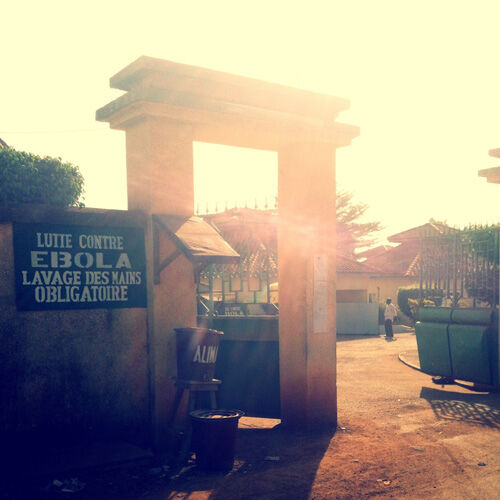 EPIET Postcard from the field - Sign in Guinea, during the Ebola outbreak: Fight Ebola, washing your hands compulsory